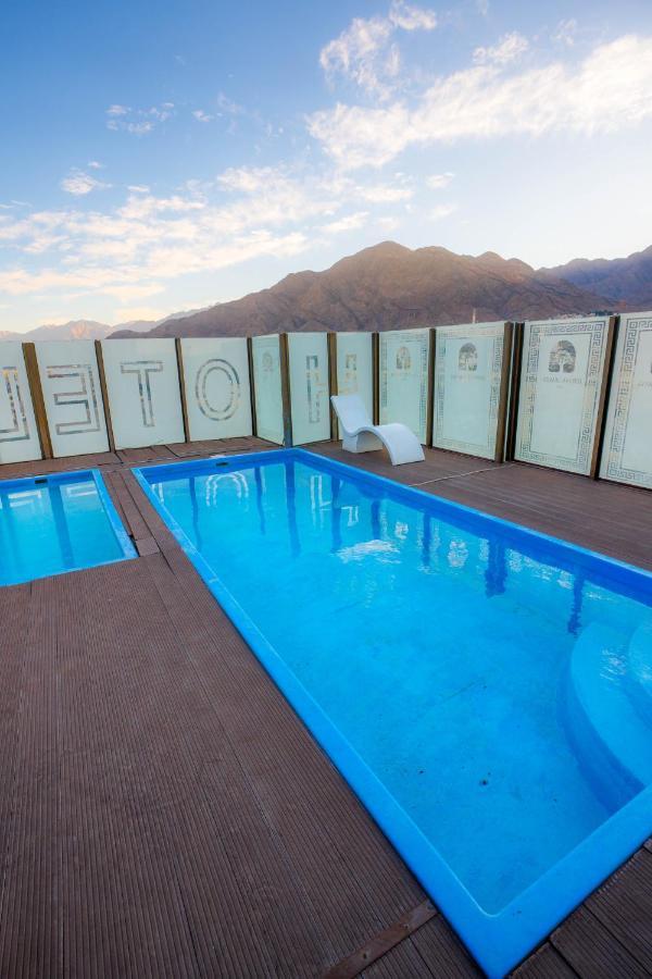 Rooftop swimming pool with mountain views