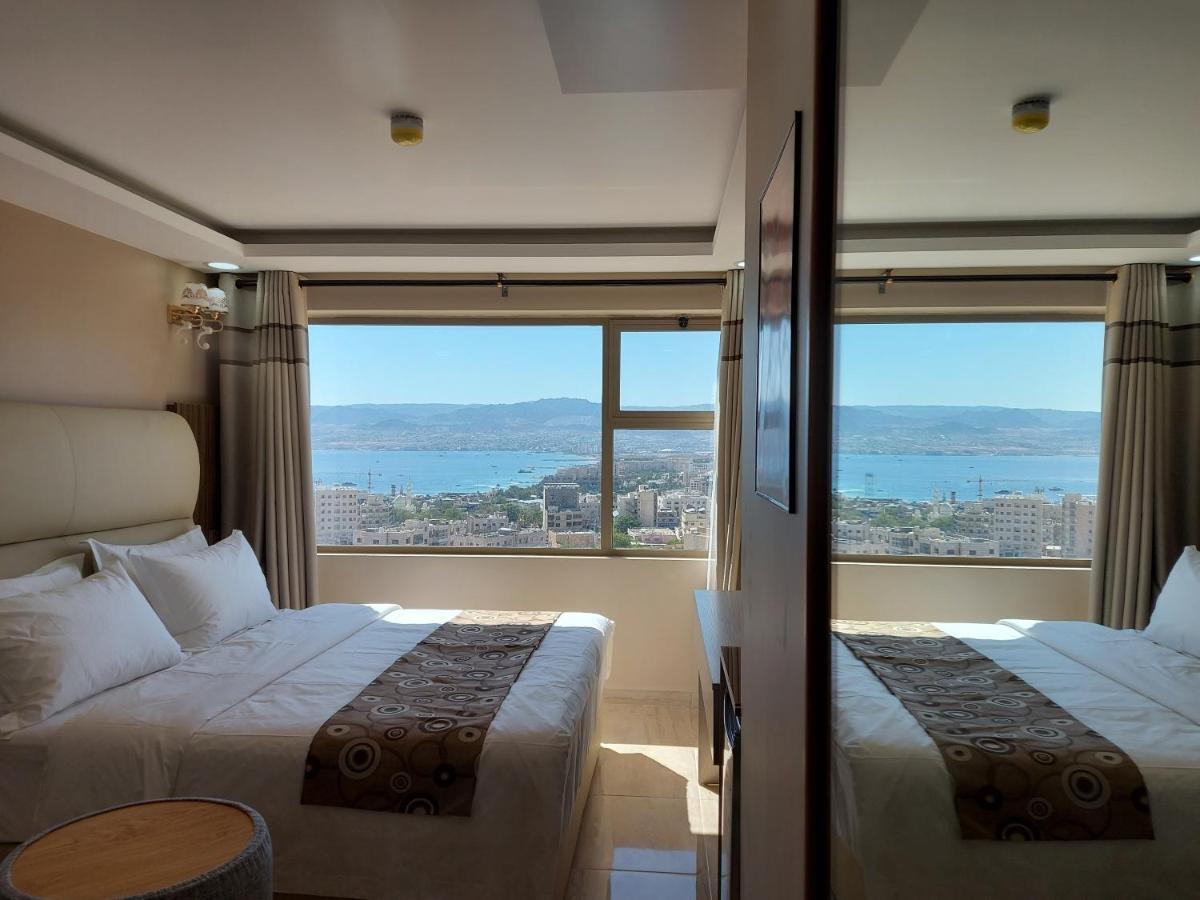 Room window looking over Aqaba to the Red Sea